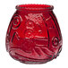 A Sterno red wax filled glass candle in a red glass vase with a design.