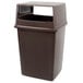 A brown Rubbermaid trash can with a lid.