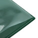 A close up of a green plastic Menu Solutions menu board cover.