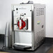 A Spaceman 6650 stainless steel frozen drink machine on a counter.