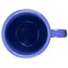 A peacock blue mug with a handle on a white background.