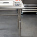 Regency 30" x 108" 16-Gauge 304 Stainless Steel Commercial Open Base Work Table with 4" Backsplash Main Thumbnail 5