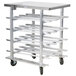 A Regency stainless steel mobile can rack with six shelves on wheels.