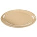 A beige oval melamine platter with a white rim.