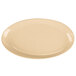 A white melamine oval platter with a beige rim.