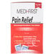 A red Medi-First box of extra strength pain relief tablets with white and blue labels.