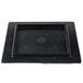 A black square melamine display board with a circle in the middle.