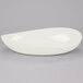 A white oval shaped GET Osslo melamine bowl.