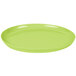 A green oval BambooServe plate on a white background.