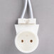 A white Avantco fluorescent light socket with two wires.