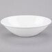 A white Libbey oval porcelain bowl.