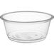 A clear plastic souffle cup with a clear lid.