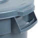 A gray Rubbermaid commercial trash can with a lid.