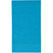 A turquoise blue paper guest towel with a white border.