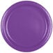 A close-up of a Creative Converting amethyst purple paper plate with a curved edge.