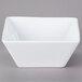 A white square Libbey porcelain bowl.