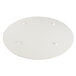 A white round melamine serving board with a faux acacia design.