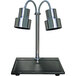 A Hanson Heat Lamps chrome carving station with black synthetic granite base and two lamps.