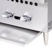 A Vulcan low profile radiant charbroiler on a counter with stainless steel.