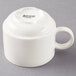 An Arcoroc white porcelain stack cup with a handle.