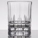 A close-up of a clear Spiegelau Perfect Serve Rocks glass with a diamond pattern.