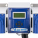 A close-up of a blue and white Dema V-Line OPL Laundry Chemical Dispenser Pump System.