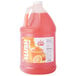 A jug of Carnival King 1 gallon orange slushy concentrate.