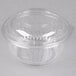 A Dart clear plastic bowl with a dome lid.