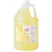 A jug of Carnival King Lemon Slush Syrup with a yellow label.