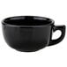 A black Tuxton cappuccino cup with a handle.