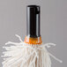 A Bar Maid polishing head set with an extra large white and orange mop.