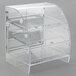 A clear plastic Vollrath bakery case with three shelves.