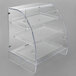 A clear plastic Vollrath bakery display case with three shelves.