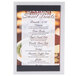 A Menu Solutions Alumitique triple view menu displayette with a brushed finish on a counter with a menu of desserts.