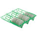 A green Cambro dish rack with white circles holding four Shoreline CamLids.