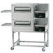 A Lincoln stainless steel ventless double electric conveyor oven package.