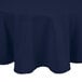A navy blue round Intedge tablecloth on a table.