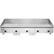 A Vulcan stainless steel electric countertop griddle with black knobs.