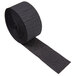 A roll of black Creative Converting streamer paper with a black ribbon on it.