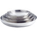 An American Metalcraft stainless steel seafood tray with a hammered finish. Three stacked silver trays.