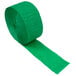 A roll of Creative Converting emerald green streamer paper.
