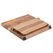 A wood cutting board with a blue metal clip and wood grained surface.