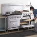 Cooking Performance Group S60-GS24-N Natural Gas 6 Burner 60" Range with 24" Griddle/Broiler and 2 Standard Ovens - 276,000 BTU Main Thumbnail 1
