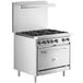 A large stainless steel Cooking Performance Group range with an open oven door.