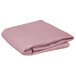 A folded pink table cover on a white background.