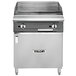 A stainless steel Vulcan V Series gas range with a griddle top.