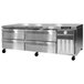 A Continental Refrigerator stainless steel chef base with four freezer drawers.