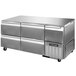 A stainless steel Continental Refrigerator undercounter refrigerator with four drawers and one half door.