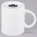 A 10 Strawberry Street white porcelain mug with a handle.