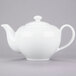 A white 10 Strawberry Street porcelain teapot with a handle.